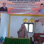 Hj. Nevi Zuairina Menghadiri Tabligh Akbar dan Mendampingi Penyerahan Pokir Baju Seragam